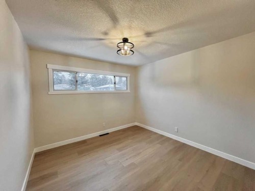 146 Springwood Drive Sw, Calgary, AB - Indoor Photo Showing Other Room