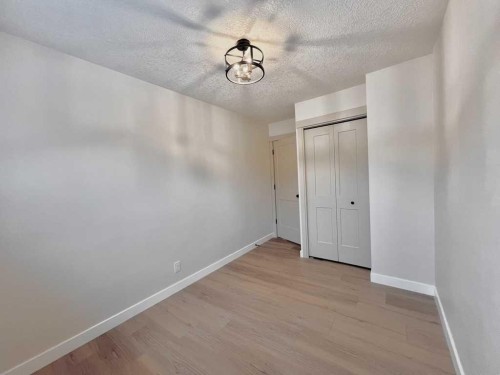 146 Springwood Drive Sw, Calgary, AB - Indoor Photo Showing Other Room