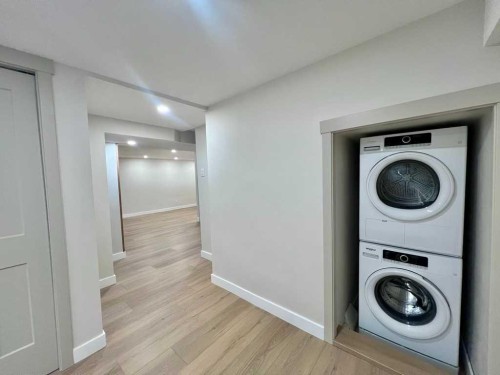 146 Springwood Drive Sw, Calgary, AB - Indoor Photo Showing Laundry Room
