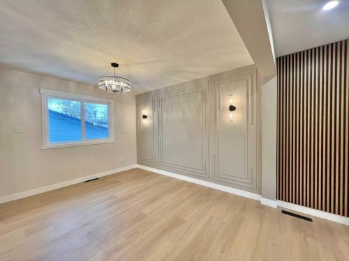 146 Springwood Drive Sw, Calgary, AB - Indoor Photo Showing Other Room