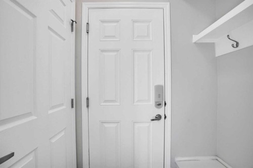 608 Windbrook Heights Sw, Airdrie, AB - Indoor Photo Showing Other Room