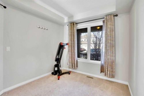 608 Windbrook Heights Sw, Airdrie, AB - Indoor Photo Showing Other Room