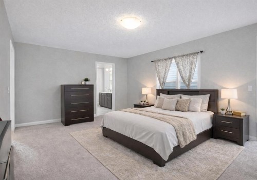 608 Windbrook Heights Sw, Airdrie, AB - Indoor Photo Showing Bedroom