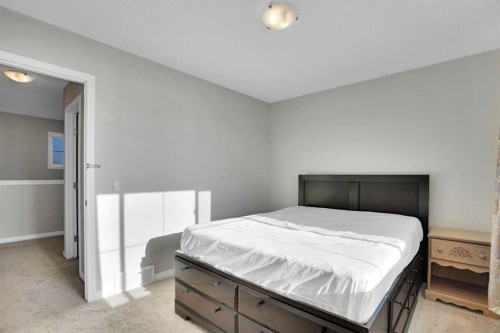 608 Windbrook Heights Sw, Airdrie, AB - Indoor Photo Showing Bedroom