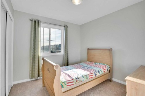 608 Windbrook Heights Sw, Airdrie, AB - Indoor Photo Showing Bedroom