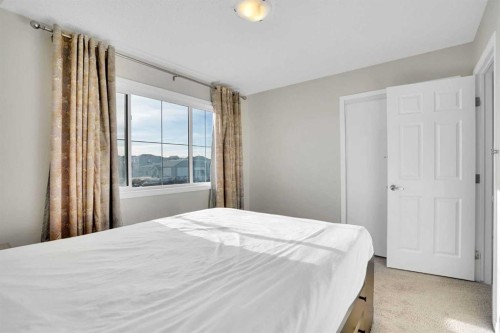 608 Windbrook Heights Sw, Airdrie, AB - Indoor Photo Showing Bedroom