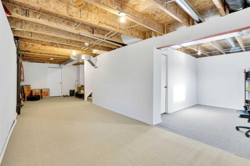608 Windbrook Heights Sw, Airdrie, AB - Indoor Photo Showing Basement