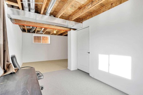 608 Windbrook Heights Sw, Airdrie, AB - Indoor Photo Showing Basement