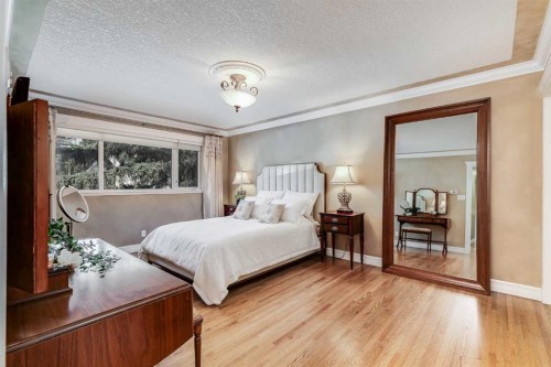 2003 Bay Shore Road Sw, Calgary, AB - Indoor Photo Showing Bedroom