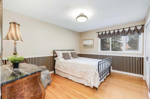 2003 Bay Shore Road Sw, Calgary, AB - Indoor Photo Showing Bedroom