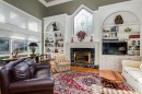 2003 Bay Shore Road Sw, Calgary, AB  - Indoor Photo Showing Living Room With Fireplace 