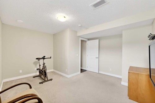 403 Sage Hill Grove Nw, Calgary, AB - Indoor Photo Showing Gym Room