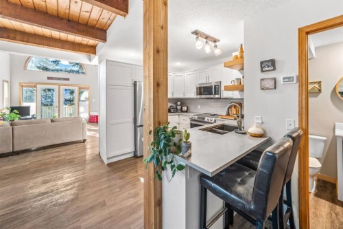 3-809 5Th Street, Canmore, AB - Indoor Photo Showing Kitchen With Double Sink