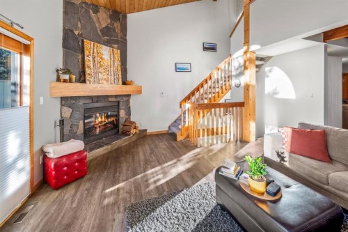 3-809 5Th Street, Canmore, AB - Indoor Photo Showing Living Room With Fireplace
