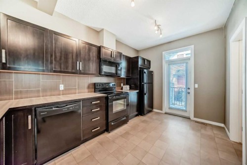 236 New Brighton Row Se, Calgary, AB - Indoor Photo Showing Kitchen