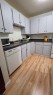 318-10120 Brookpark Boulevard Sw, Calgary, AB  - Indoor Photo Showing Kitchen With Double Sink 