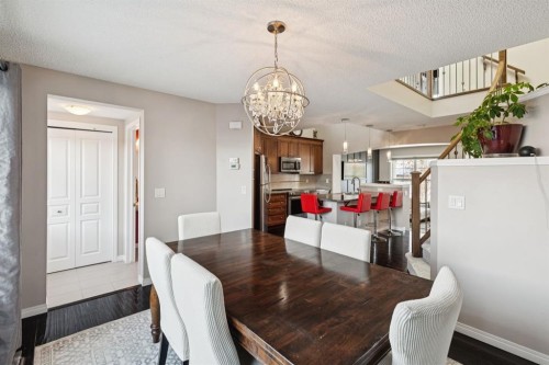 15 New Brighton Common Se, Calgary, AB - Indoor Photo Showing Dining Room