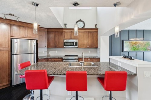 15 New Brighton Common Se, Calgary, AB - Indoor Photo Showing Kitchen With Upgraded Kitchen