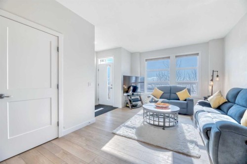 196 Wolf Hollow Park Se, Calgary, AB - Indoor Photo Showing Living Room