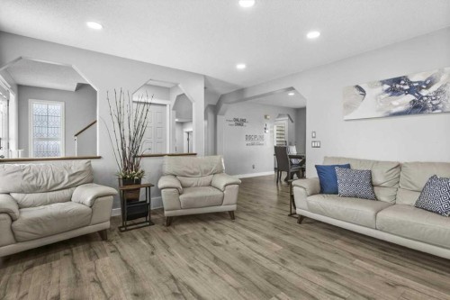 39 Prestwick Heath Se, Calgary, AB - Indoor Photo Showing Living Room