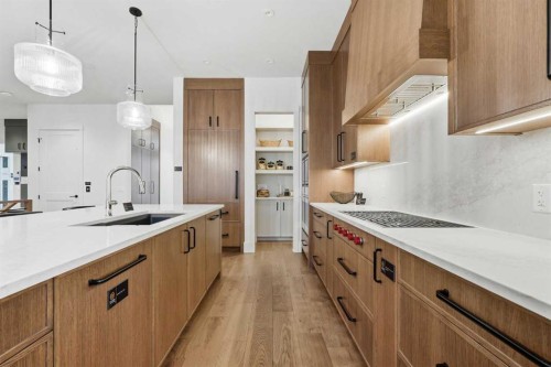 733 Serenity Bend, Heritage Pointe, AB - Indoor Photo Showing Kitchen With Upgraded Kitchen