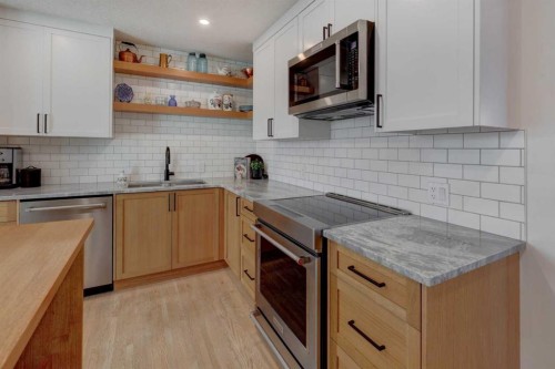 36 Glenview Drive Sw, Calgary, AB - Indoor Photo Showing Kitchen With Stainless Steel Kitchen With Upgraded Kitchen