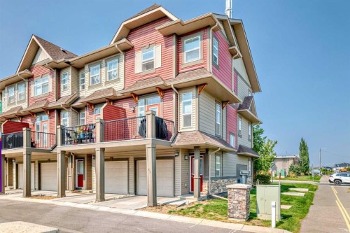 63 Legacy Path Se, Calgary, AB - Outdoor With Balcony With Facade