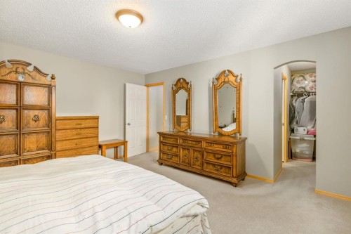 131 Panatella Close Nw, Calgary, AB - Indoor Photo Showing Bedroom