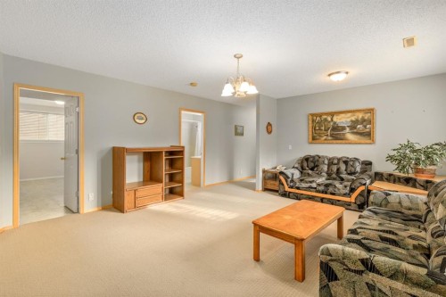 131 Panatella Close Nw, Calgary, AB - Indoor Photo Showing Living Room