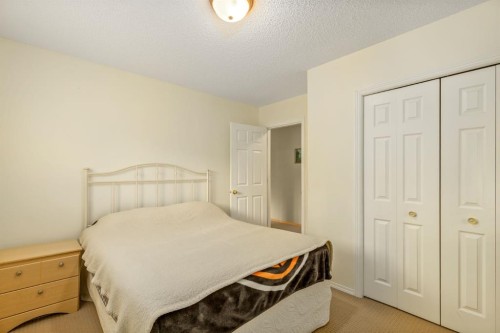 131 Panatella Close Nw, Calgary, AB - Indoor Photo Showing Bedroom