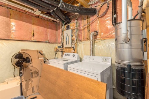 131 Panatella Close Nw, Calgary, AB - Indoor Photo Showing Laundry Room