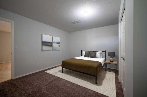 269 Strathford Crescent, Strathmore, AB - Indoor Photo Showing Bedroom