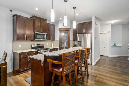 254 Silverado Plains Circle Sw, Calgary, AB - Indoor Photo Showing Kitchen With Upgraded Kitchen