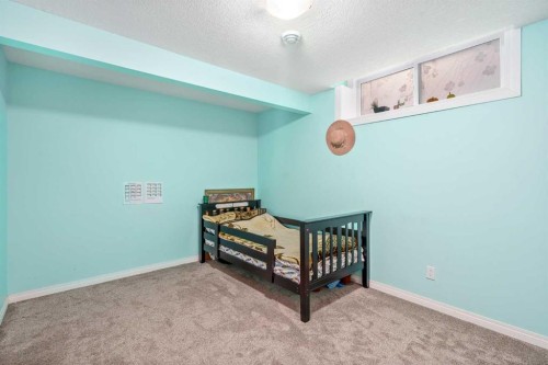 254 Silverado Plains Circle Sw, Calgary, AB - Indoor Photo Showing Bedroom