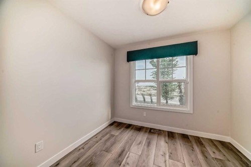 210 Alpine Avenue Sw, Calgary, AB - Indoor Photo Showing Other Room