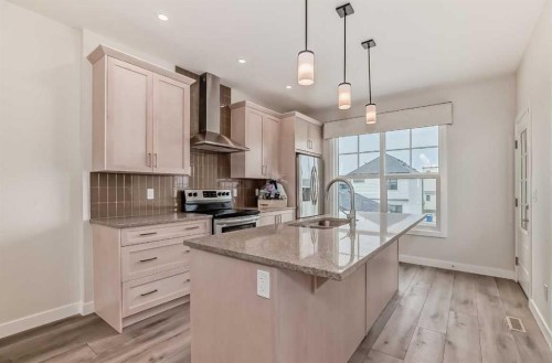 210 Alpine Avenue Sw, Calgary, AB - Indoor Photo Showing Kitchen With Double Sink With Upgraded Kitchen