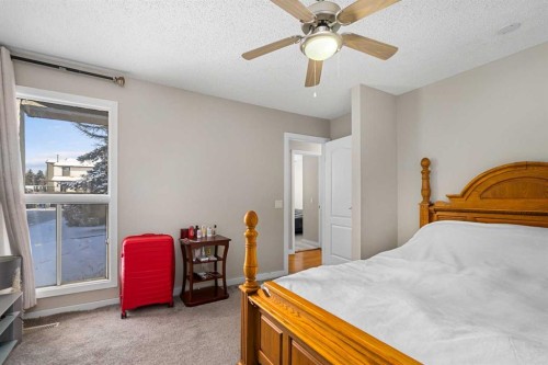 901-2520 Palliser Drive Sw, Calgary, AB - Indoor Photo Showing Bedroom
