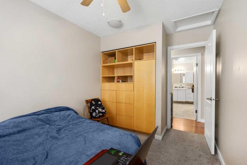 901-2520 Palliser Drive Sw, Calgary, AB - Indoor Photo Showing Bedroom