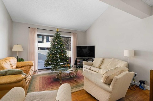 901-2520 Palliser Drive Sw, Calgary, AB - Indoor Photo Showing Living Room