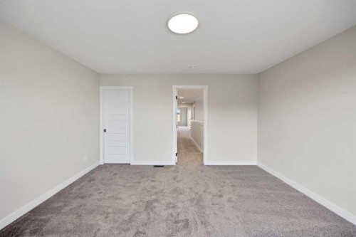 135 Homestead Common Ne, Calgary, AB - Indoor Photo Showing Other Room