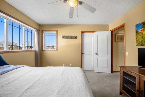 132 Bow Ridge Drive, Cochrane, AB - Indoor Photo Showing Bedroom
