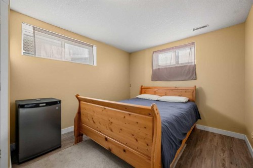 132 Bow Ridge Drive, Cochrane, AB - Indoor Photo Showing Bedroom