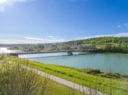 132 Bow Ridge Drive, Cochrane, AB - Outdoor With Body Of Water With View
