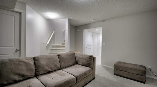 393 Walden Parade Se, Calgary, AB - Indoor Photo Showing Living Room