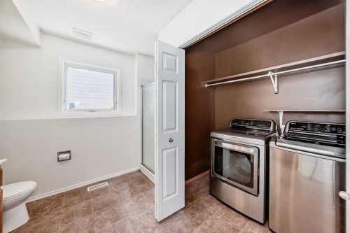 9875 Hidden Valley Drive Nw, Calgary, AB - Indoor Photo Showing Laundry Room