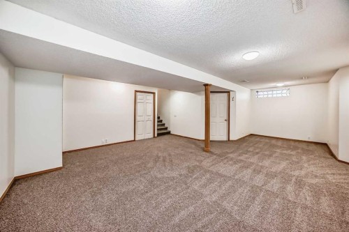 9875 Hidden Valley Drive Nw, Calgary, AB - Indoor Photo Showing Other Room