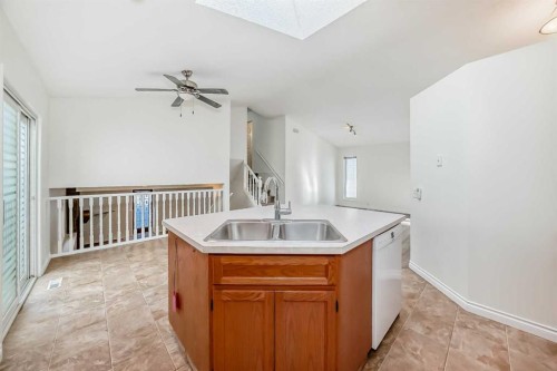 9875 Hidden Valley Drive Nw, Calgary, AB - Indoor Photo Showing Kitchen With Double Sink