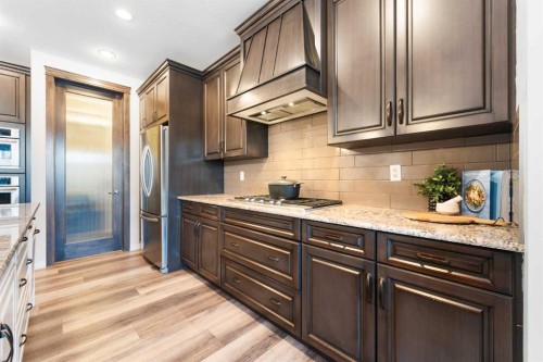 128 Auburn Bay Avenue Se, Calgary, AB - Indoor Photo Showing Kitchen With Upgraded Kitchen