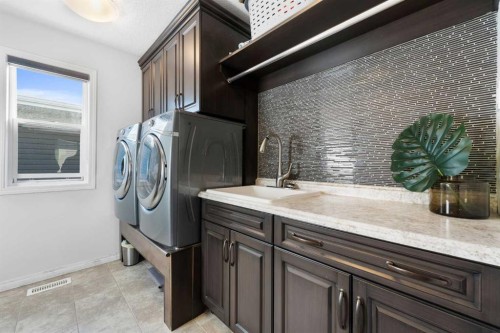 128 Auburn Bay Avenue Se, Calgary, AB - Indoor Photo Showing Laundry Room