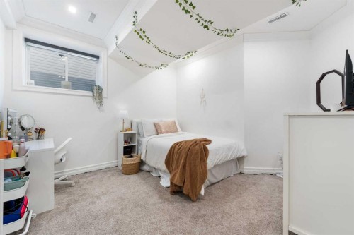 128 Auburn Bay Avenue Se, Calgary, AB - Indoor Photo Showing Bedroom
